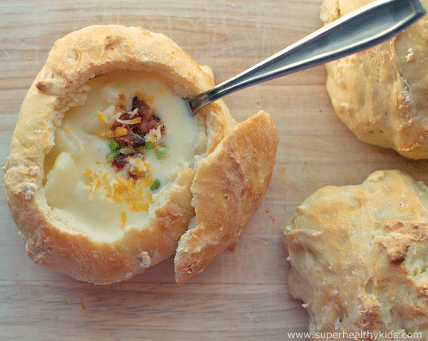Loaded Baked Potato Soup Recipe in Bread Bowls. Our favorite dinner- POTATO SOUP! And who doesn't love it in a homemade bread bowl??