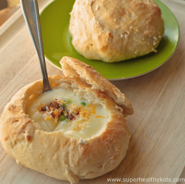 Loaded Baked Potato Soup Recipe in Bread Bowls. Our favorite dinner- POTATO SOUP! And who doesn't love it in a homemade bread bowl??